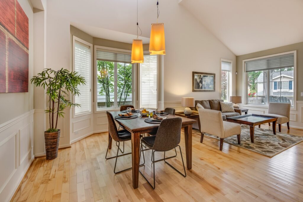 Bright dining room with a wooden table and chairs