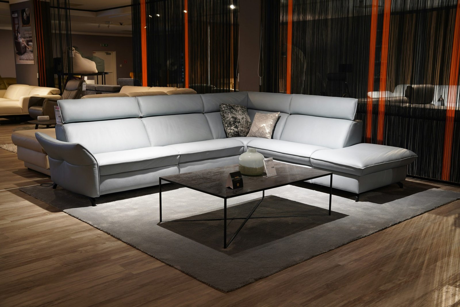 Furniture showroom with a white sectional sofa